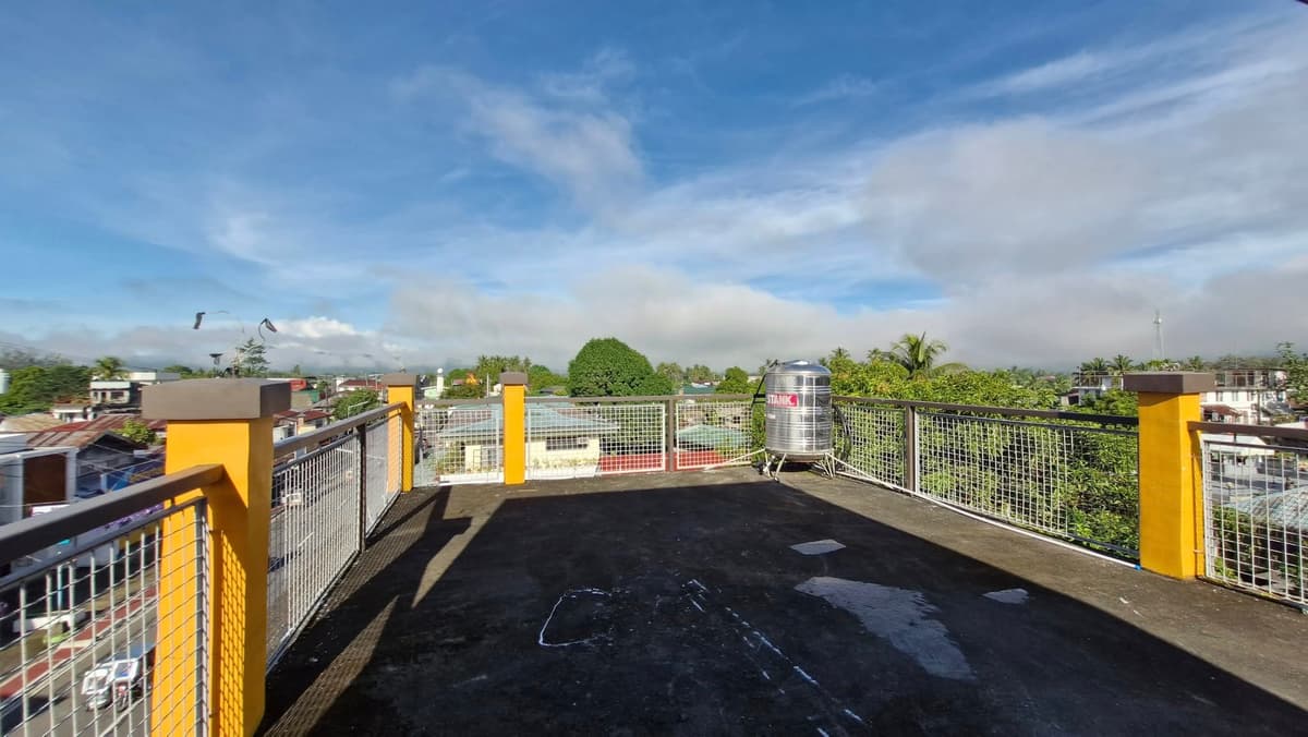 Rooftop deck space with mountain views
